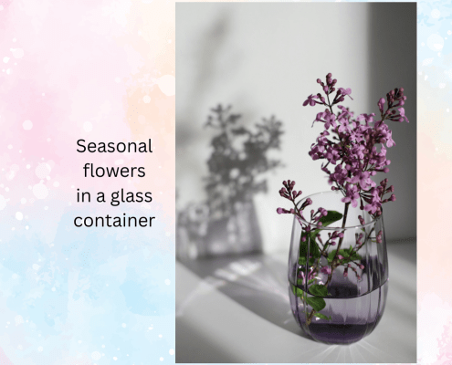 photo of seasonal flowers in a glass vase